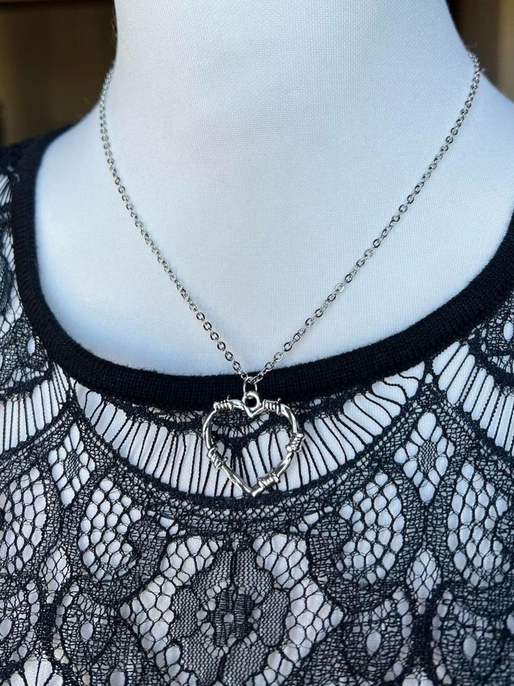 Gothic silver pendant necklace with barbed wire heart charm